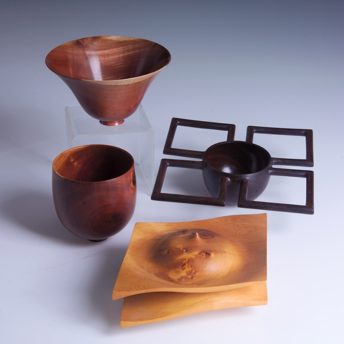 Appraisal: BERT MARSH Four turned wood pieces Two turned footed bowls