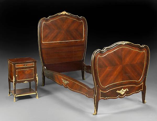 Appraisal: A Louis XV style gilt bronze mounted mahogany bed and