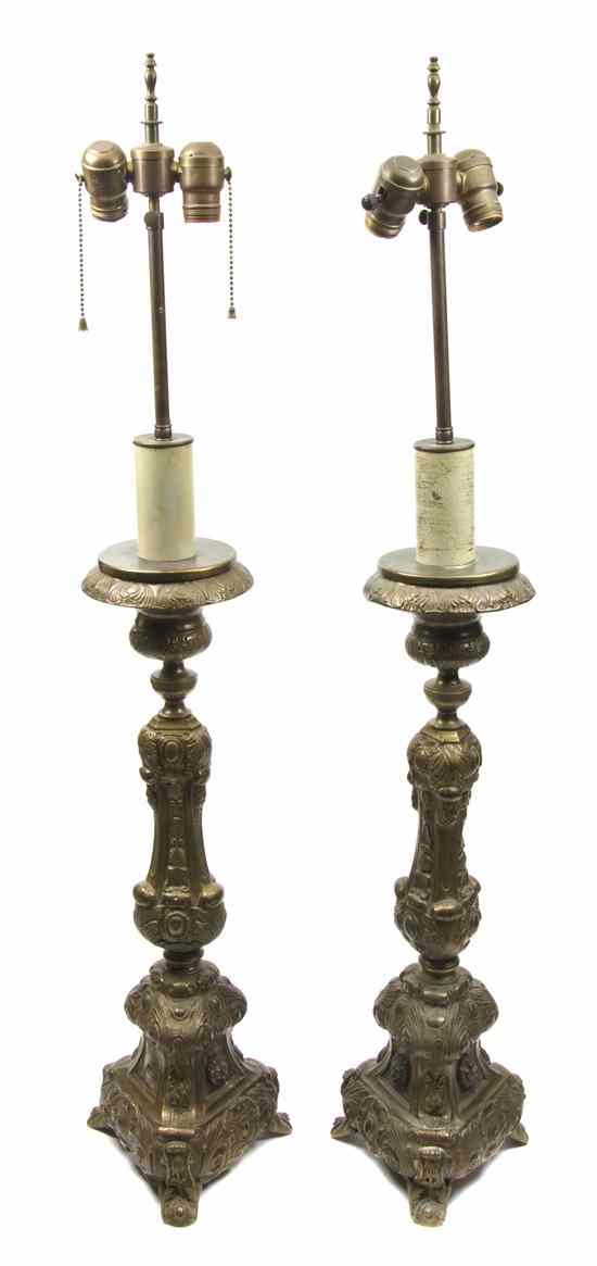 Appraisal: A Pair of Pricket Sticks of baluster form with tripartite