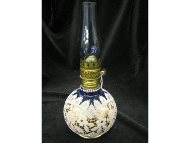 Appraisal: Victorian Miniature Oil Lamp enameled on cobalt with cobalt chimney