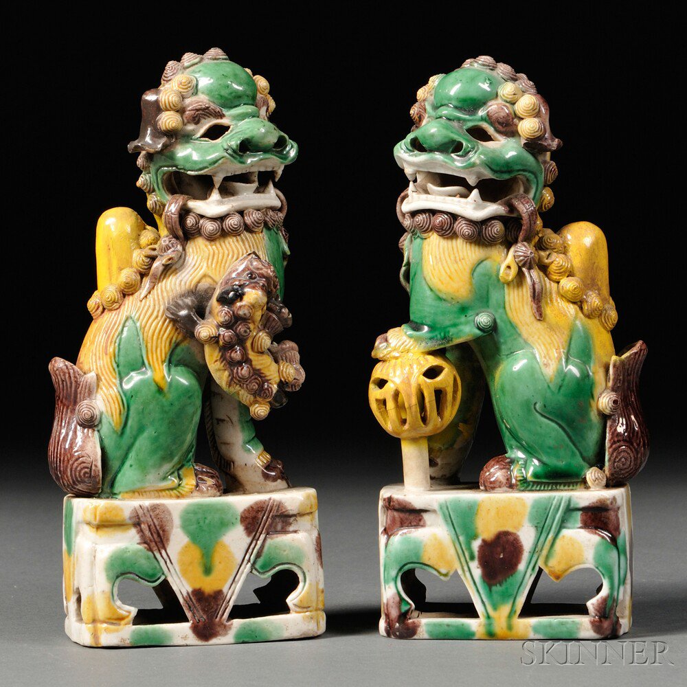 Appraisal: Pair of Egg-and-spinach-glazed Incense Holders China th th century in