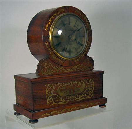 Appraisal: A Regency period rosewood and brass inlaid bracket clock By