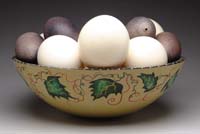 Appraisal: COLLECTION OF HOLLOW OSTRICH EGGS AND A DECORATED WOOD BOWL