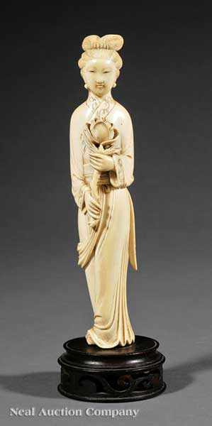 Appraisal: An Antique Japanese Carved Ivory Figure of a Bijin the