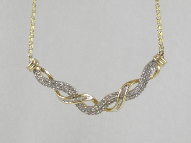 Appraisal: DIAMOND AND FOURTEEN KARAT GOLD NECKLACE between to lengths of