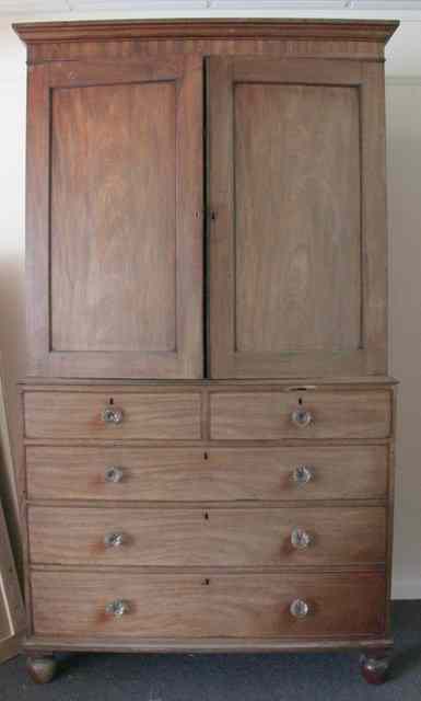 Appraisal: A th Century mahogany linen press the moulded cornice over