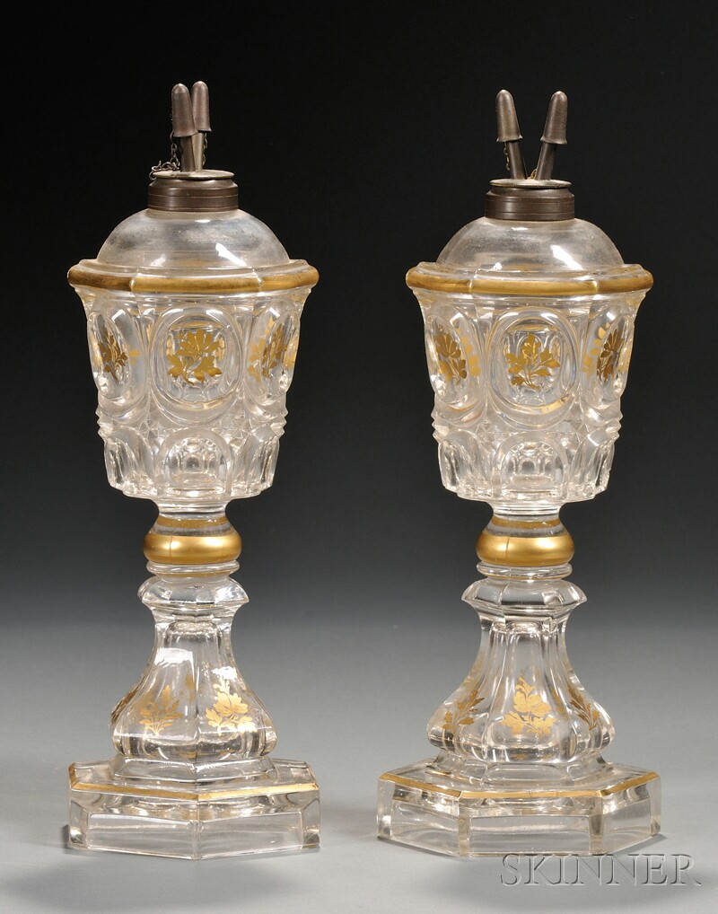 Appraisal: Pair of Gilt-decorated Pressed Colorless Glass Camphene Burning Lamps probably