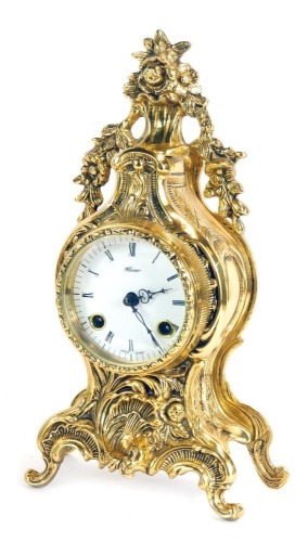 Appraisal: A Mozer brass mantel clock enamel dial eight day movement