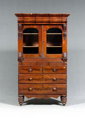 Appraisal: Classical mahogany bookcase over chest of two-case construction top with