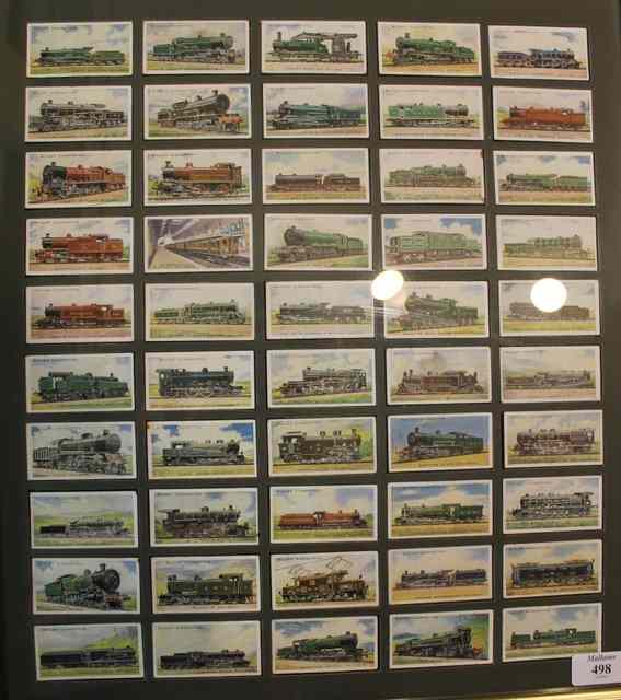 Appraisal: A FRAMED SET OF RAILWAY CIGARETTE CARDS and two albums