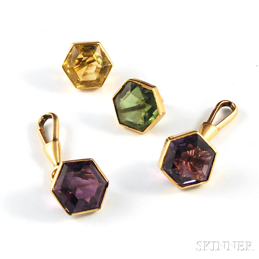 Appraisal: Four Interchangeable Semiprecious Colored Gemstone Cuff Buttons two amethyst one