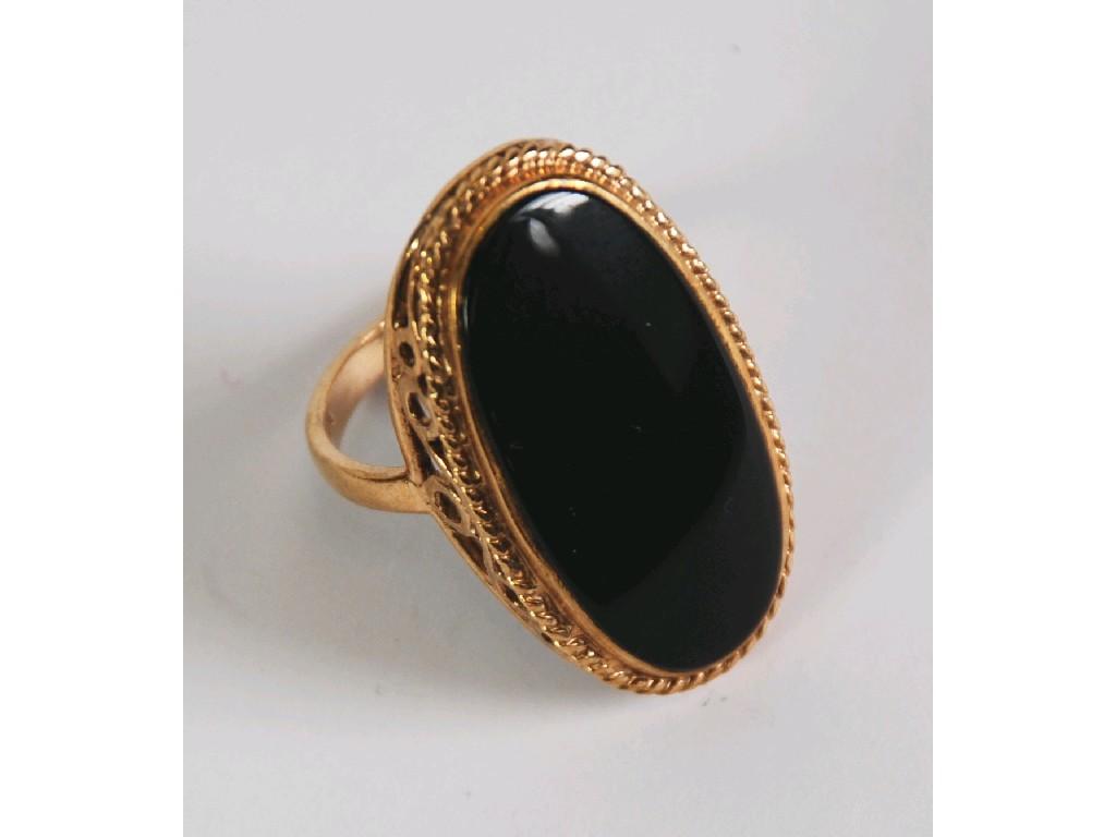 Appraisal: ct GOLD DRESS RING set with a large oval black