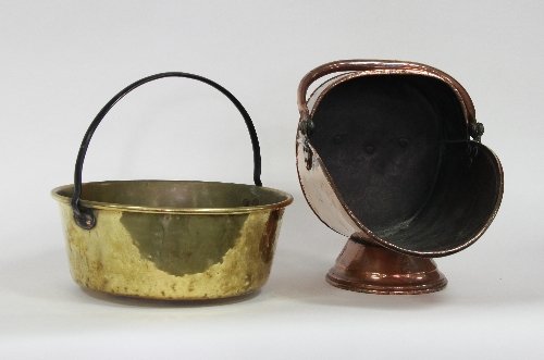 Appraisal: A copper coal scuttle of helmet shape cm '' long