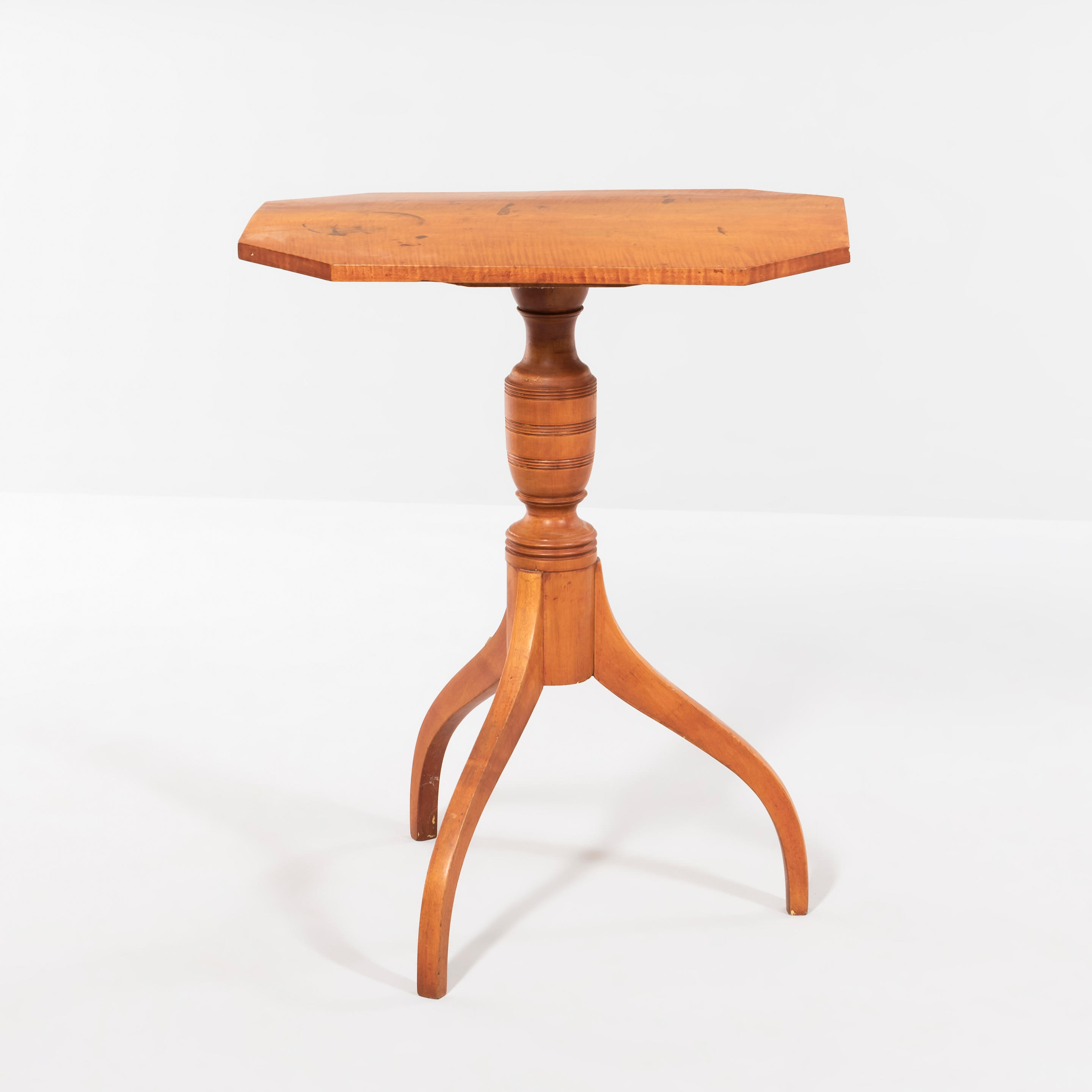 Appraisal: Federal-style Tiger-maple Stand with turned vasiform shaft and hexagonal top