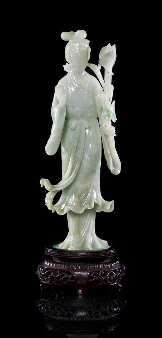 Appraisal: A Jadeite Model Carving of a Woman of semi-transparent pale