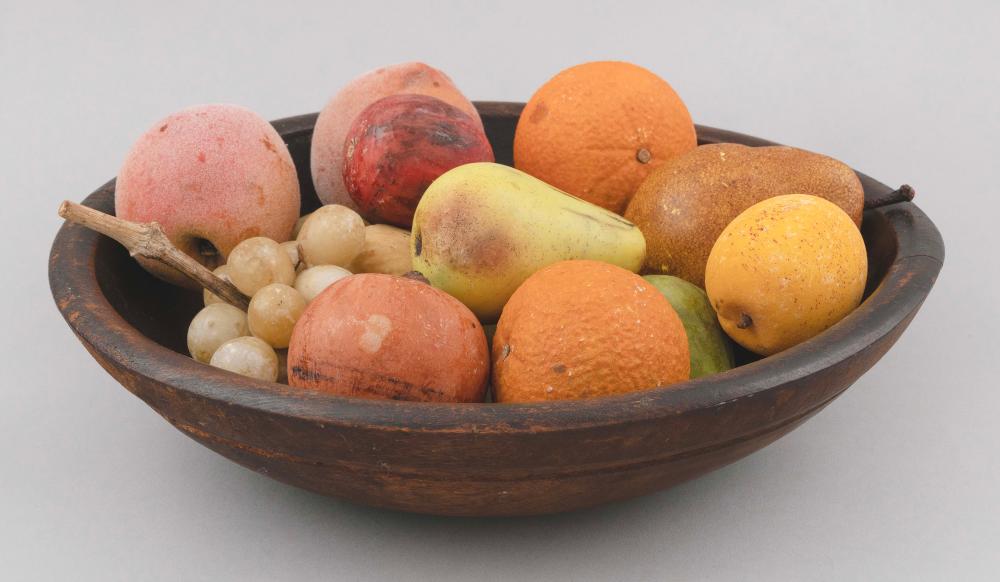 Appraisal: SIXTEEN PIECES OF CARVED STONE FRUIT IN A BURLWOOD BOWL