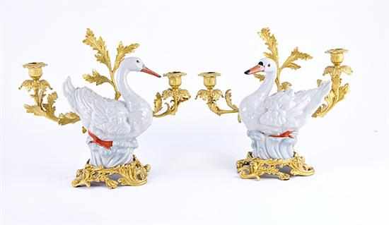 Appraisal: Pair Rococo style gilt-bronze-mounted porcelain swan-form candelabra th century Meissen