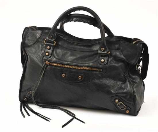 Appraisal: A HANDBAG BY BALENCIAGA Styled in black textured leather with