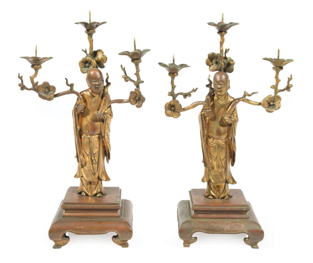 Appraisal: Good Pair of Chinese Gilt Bronze Figural Three-Light Pricket Candle