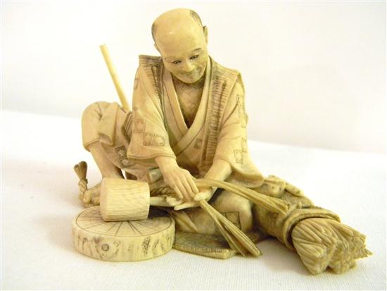 Appraisal: Japanese th century ivory figure of a seated man weaving