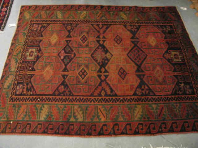 Appraisal: Kord Persian Handmade Rug overall geometric deep earthtones flat pile