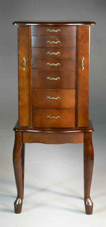 Appraisal: Wooden Jewelry CabinetHaving seven drawers raised on long cabriole legs