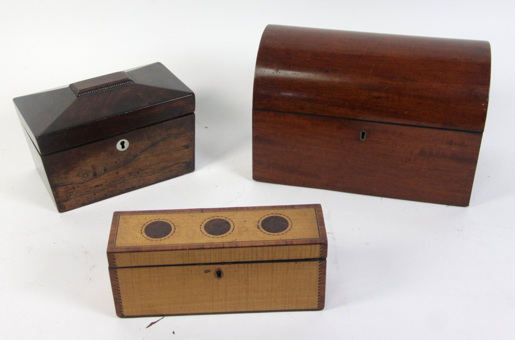 Appraisal: A rectangular satin birch and inlaid box with secret compartment