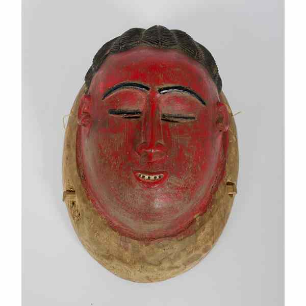 Appraisal: African Yoruba Mask realistic rendering of a face and painted