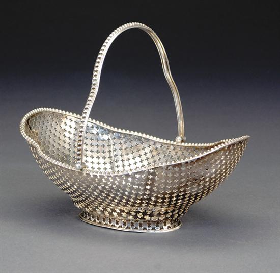 Appraisal: Silverplate basket hinged shaped handle on ovoid geometric reticulated basket-form