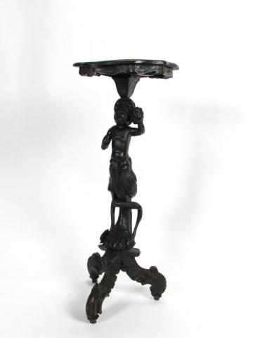 Appraisal: Carved antique fern stand depicting mythical half-human half beast holding