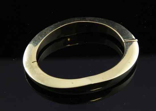 Appraisal: An Italian ct gold stiff bracelet of shaped oval design