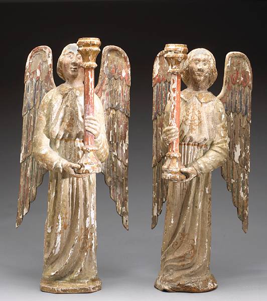 Appraisal: A pair of Italian polychrome and parcel gilt wood figures