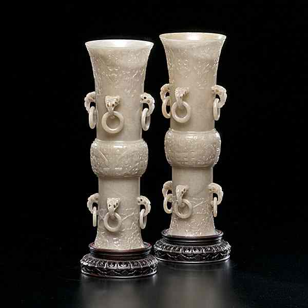 Appraisal: Yellow Jade Gu-Form Chinese Vases Chinese early th century A