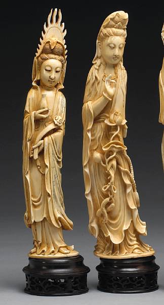 Appraisal: Two tinted ivory figures of Guanyin First half of th