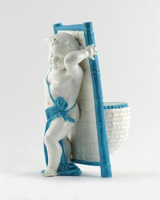 Appraisal: A porcelain white-glazed model of a cherub supporting on his