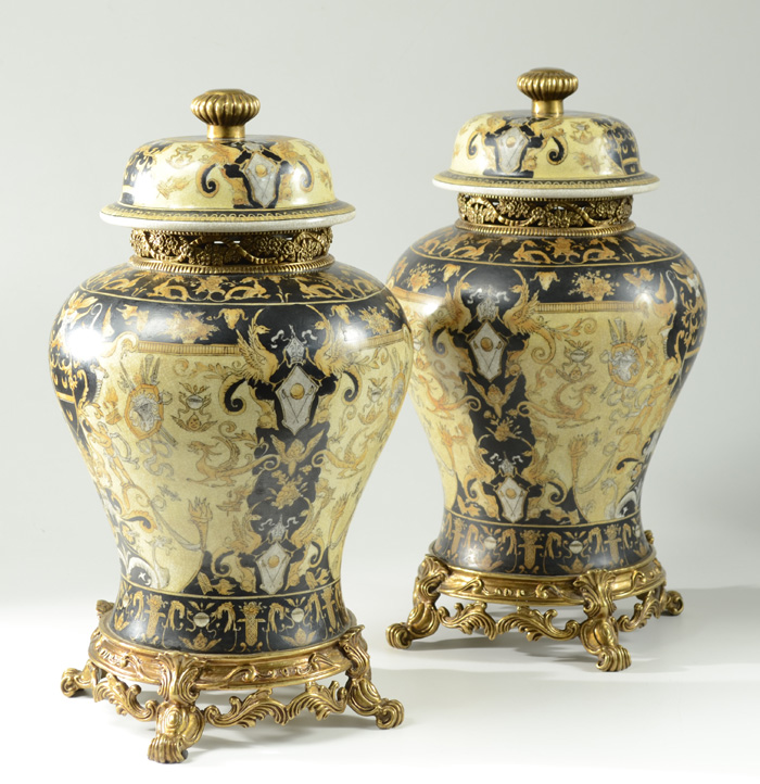 Appraisal: PAIR CONTINENTAL STYLE PORCELAIN GILT BRONZE URNS by United Wilson