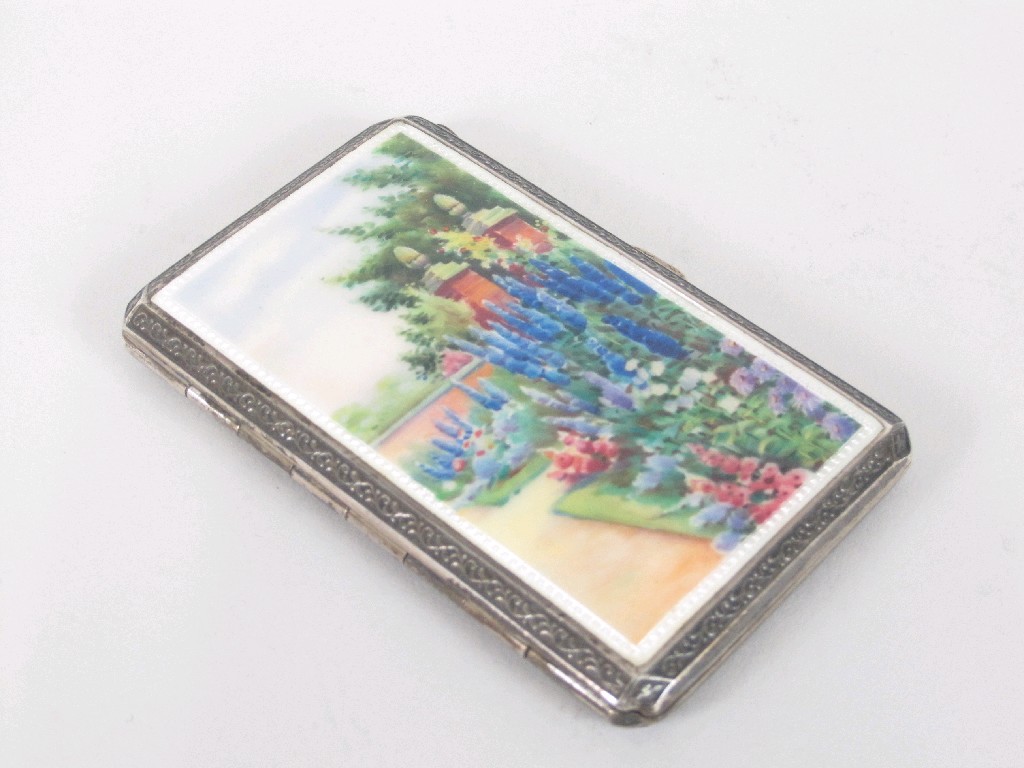 Appraisal: A George V Cigarette Case enamelled garden scene import mark