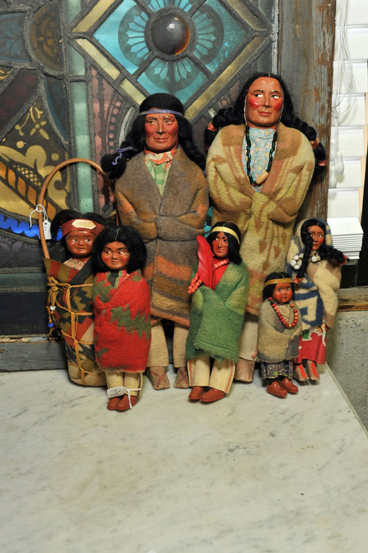 Appraisal: SEVEN SKOOKUM DOLLS Five male figures one female and one