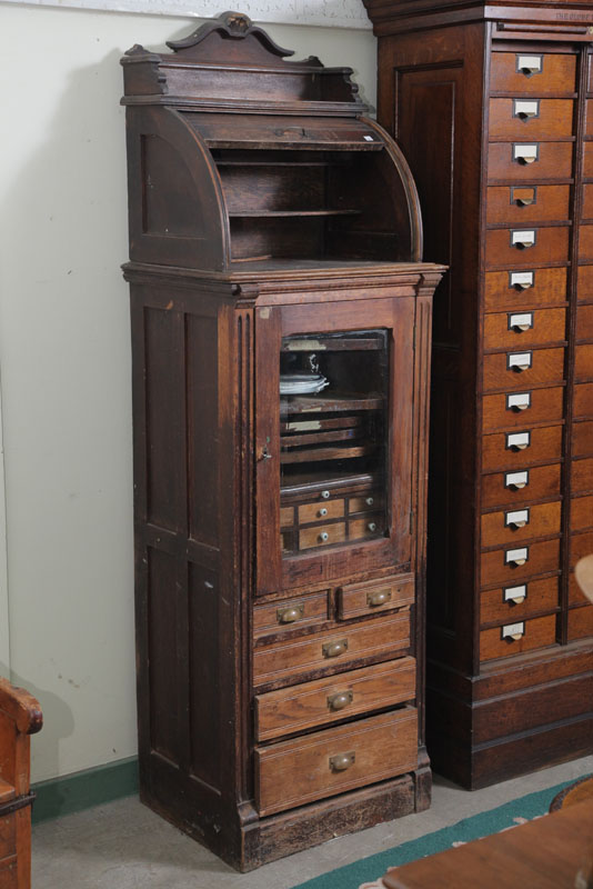 Appraisal: DENTAL CABINET Oak having an open top with tambour door