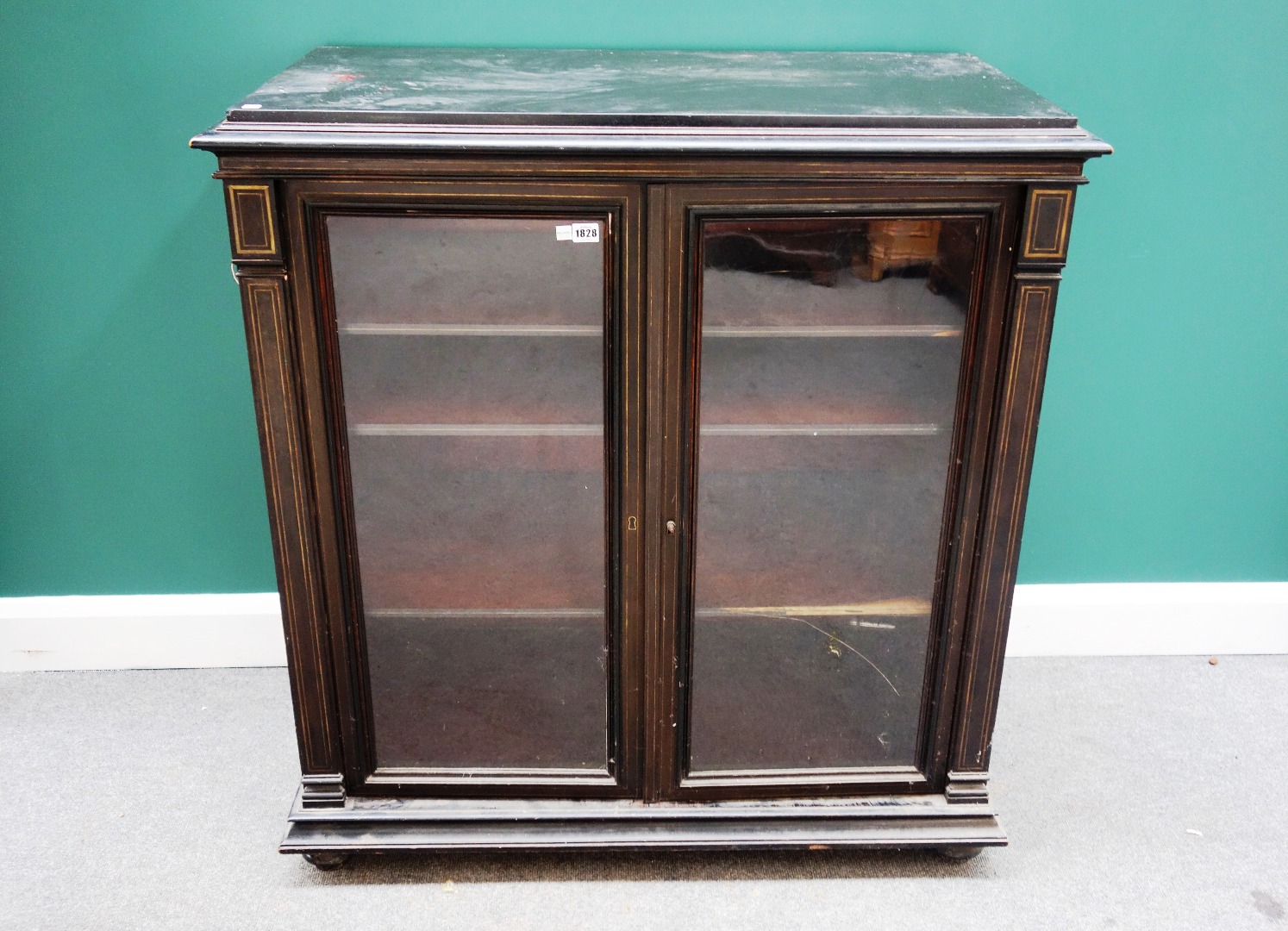 Appraisal: A th century side cabinet the rectangular black marble top