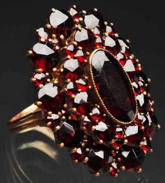 Appraisal: K Y Gold Garnet Ring Weight grams dwt Condition Excellent