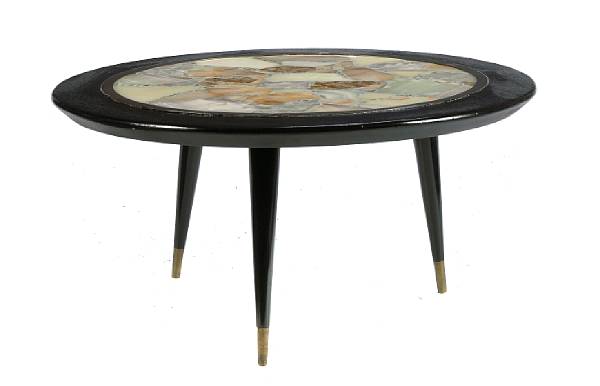 Appraisal: A contemporary specimen marble coffee table height in diameter in