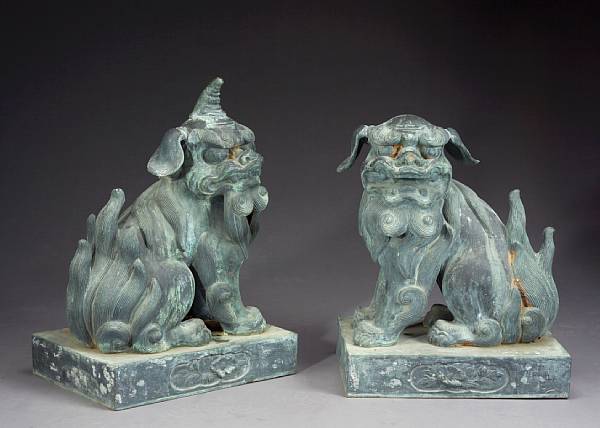 Appraisal: A pair of large bronze figures of koma-inu th th