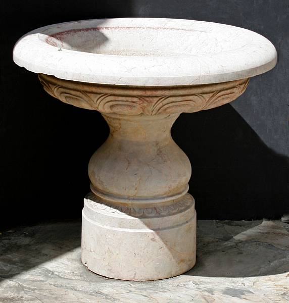 Appraisal: The basin with everted rim carved with a water reed