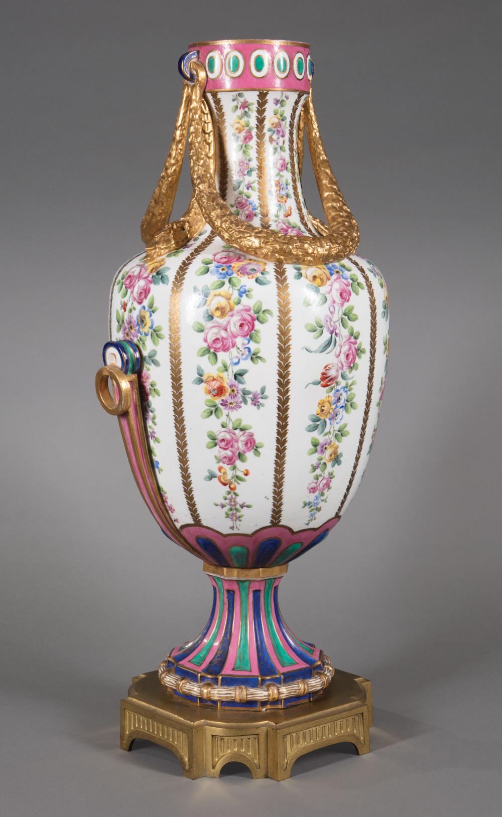 Appraisal: Large Continental Polychrome and Gilt Porcelain Urn late th c