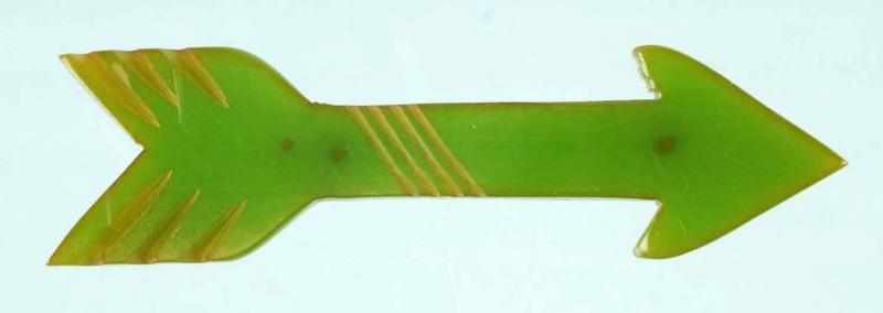 Appraisal: Bakelite Carved Green Arrow Pin Condition Excellent Size L