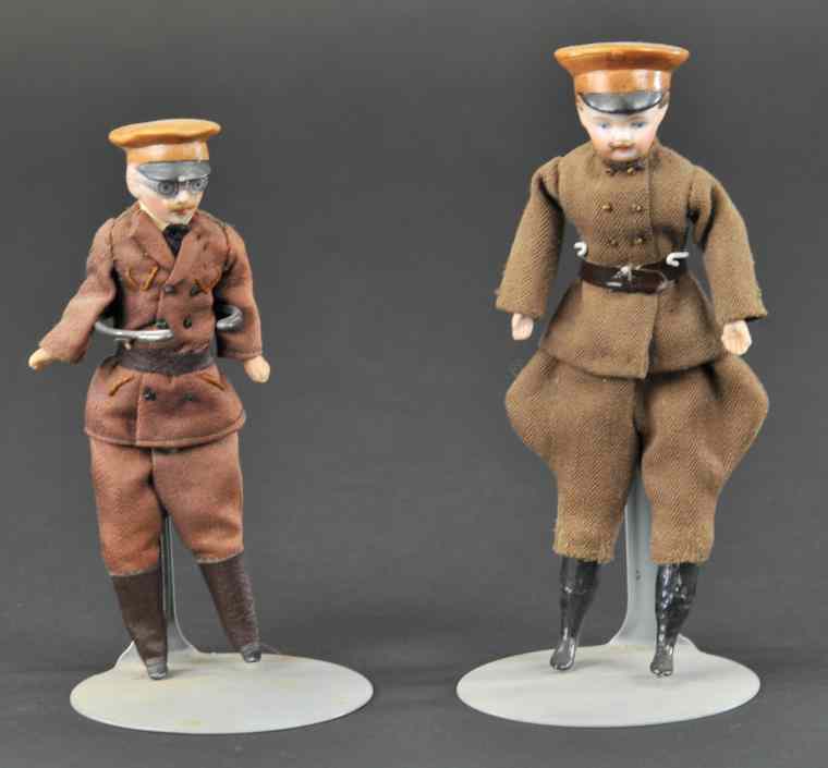 Appraisal: LOT OF TWO BISQUE CHAUFFEUR FIGURES Germany both fully dressed