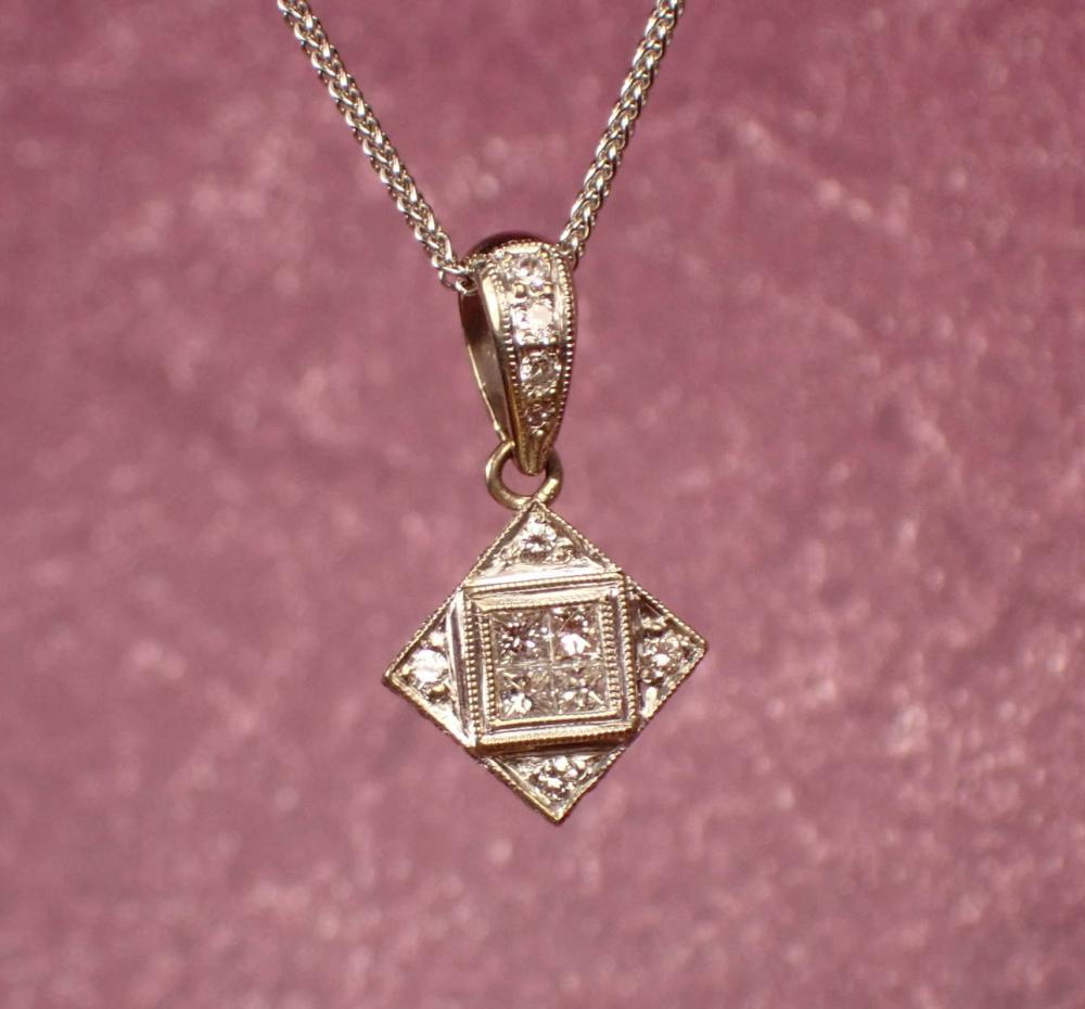 Appraisal: DIAMOND AND EIGHTEEN KARAT WHITE GOLD PENDANT NECKLACE the square