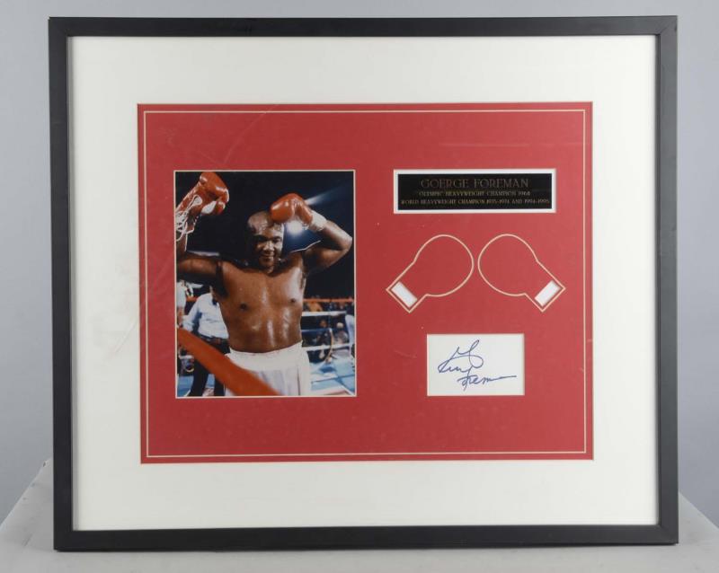 Appraisal: George Foreman Commemorative Display Includes color photo and signature with