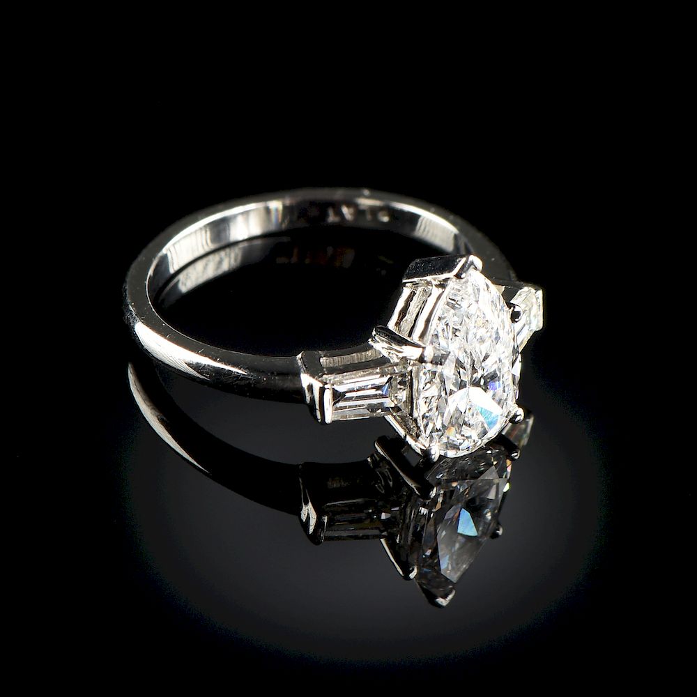 Appraisal: A PLATINUM AND PEAR-SHAPED DIAMOND LADY'S RING A PLATINUM AND